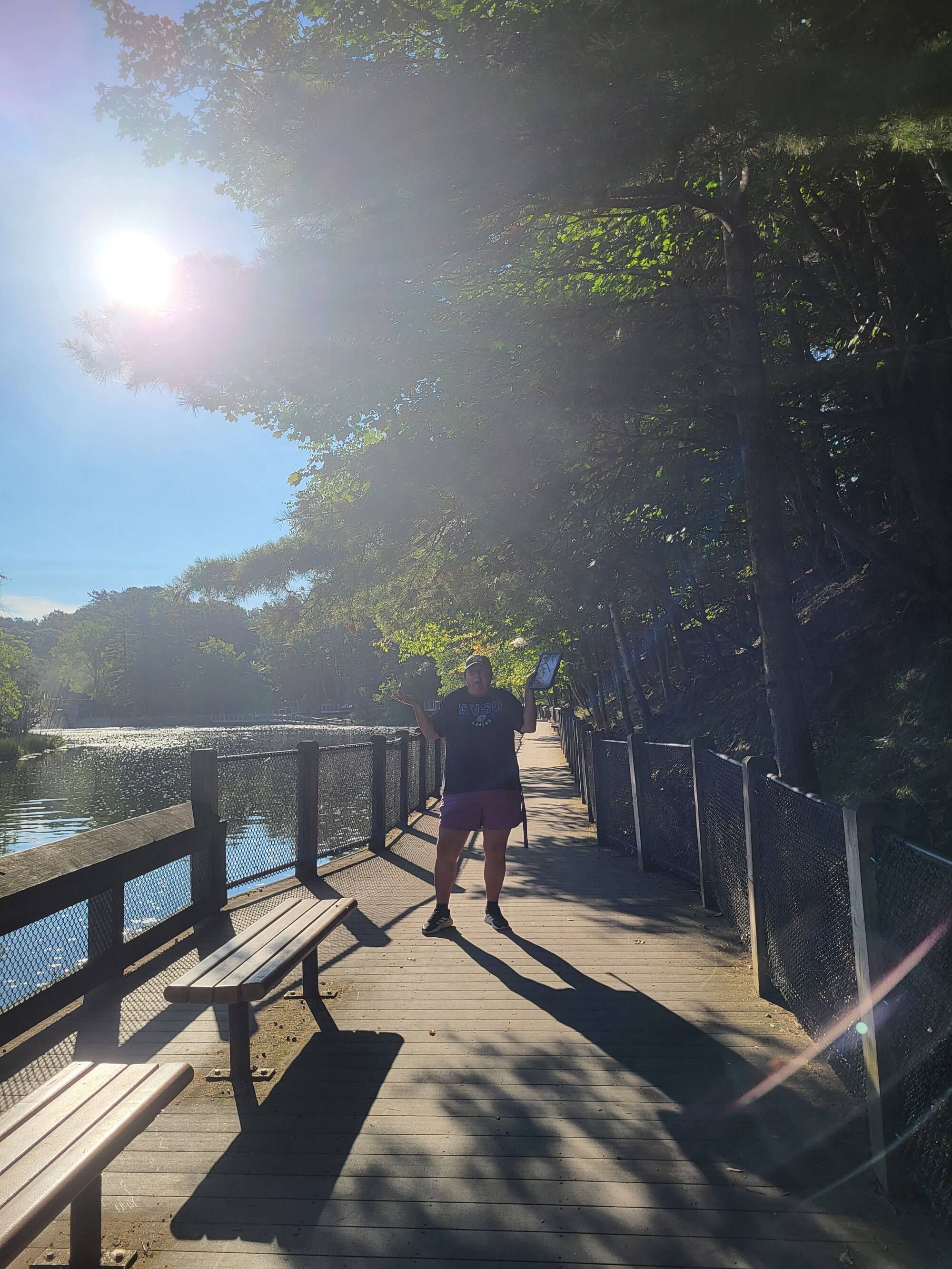 A research assistant looks for anglers at the Hamlin Dam in Ludington, Michigan